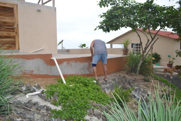 Painting the cement foundation